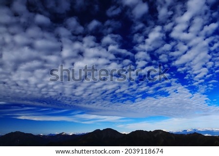 superb view of central alps from the summit of Mt.Shiomi in the Southern Alps,ina city,nagano prefecture,japan. Royalty-Free Stock Photo #2039118674