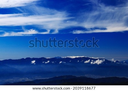 superb view of central alps from the summit of Mt.Shiomi in the Southern Alps,ina city,nagano prefecture,japan. Royalty-Free Stock Photo #2039118677