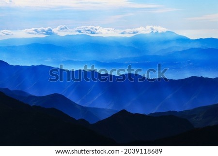 superb view of central alps from the summit of Mt.Shiomi in the Southern Alps,ina city,nagano prefecture,japan. Royalty-Free Stock Photo #2039118689