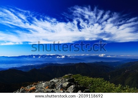 superb view of central alps from the summit of Mt.Shiomi in the Southern Alps,ina city,nagano prefecture,japan. Royalty-Free Stock Photo #2039118692