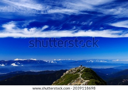 superb view of central alps from the summit of Mt.Shiomi in the Southern Alps,ina city,nagano prefecture,japan. Royalty-Free Stock Photo #2039118698