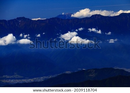 superb view of central alps from the summit of Mt.Shiomi in the Southern Alps,ina city,nagano prefecture,japan. Royalty-Free Stock Photo #2039118704