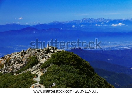 superb view of northern alps from the summit of Mt.Shiomi in the Southern Alps,ina city,nagano prefecture,japan. Royalty-Free Stock Photo #2039119805