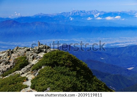 superb view of northern alps from the summit of Mt.Shiomi in the Southern Alps,ina city,nagano prefecture,japan. Royalty-Free Stock Photo #2039119811