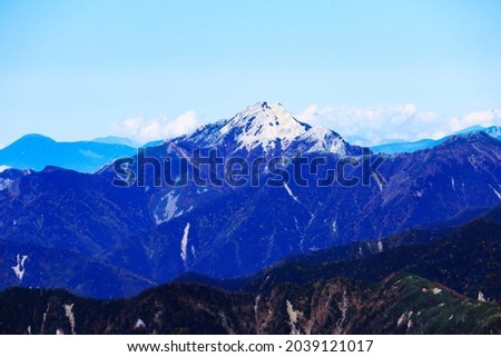 superb view of mt.kaikoma from the summit of mt.shiomi in the Southern Alps,ina city,nagano prefecture,japan Royalty-Free Stock Photo #2039121017