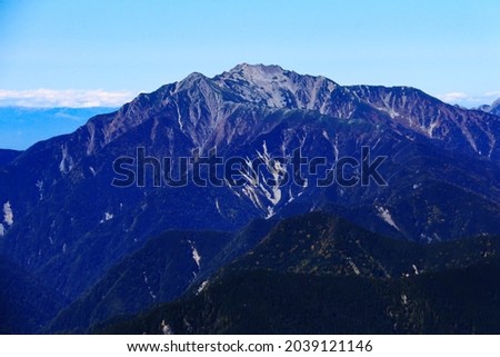 superb view of mt.senjo from the summit of mt.shiomi in the Southern Alps,ina city,nagano prefecture,japan Royalty-Free Stock Photo #2039121146