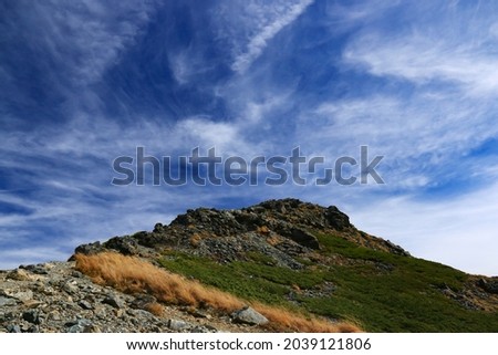 superb view of the summit of Mt.Shiomi in the Southern Alps,ina city,nagano prefecture,japan. Royalty-Free Stock Photo #2039121806