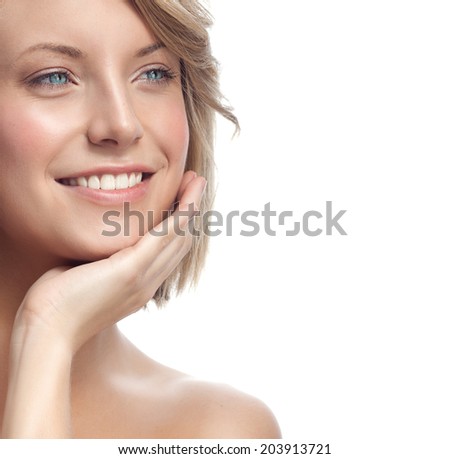 closeup portrait of attractive  caucasian smiling woman blond isolated on white studio shot lips toothy smile face hair head and shoulders  blue eyes tooth