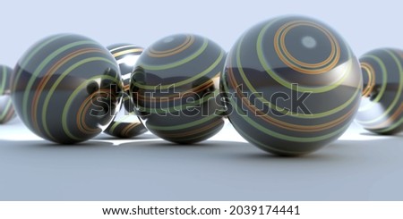 3d illustration of black spheres with bright colored stripes on bluish gray background and surface illuminated with blur