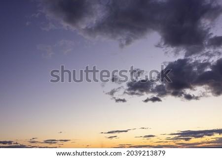 Dark lilac sky and clouds at sunset.