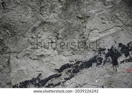 Old dirty wall close up. Grunge abstract photo background.  Beautiful stone texture pattern. Good for post-processing and design
