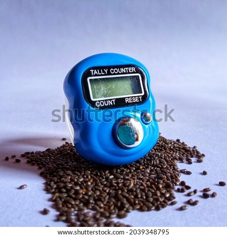 A blue digital counter on the seeds