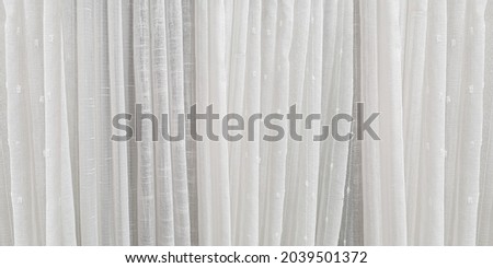 Curtains with sheer fabric Sunlight can pass through Used to decorate the house to be beautiful, wedding backdrop decorative window, Background of fabric texture white Gray