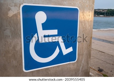 Disability parking sign reserved for wheelchair users
