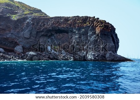 Salina island (Aeolian archipelago), Messina, Sicily, Italy: view of the natural arch of "Punta Perciato" in Pollara.