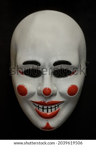 Clown Half Mask Isolated Against Black Background