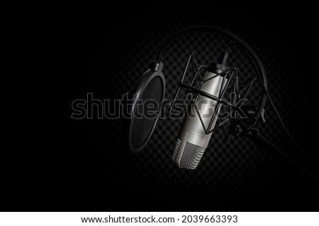 Studio microphone for recording and singer with pop filter on tripod in the darkness background