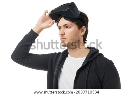 Serious man with VR headset