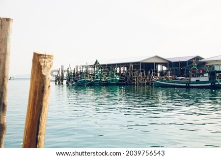 Traditional Khmer fishing boats moored at the harbor of Koh Sdach Island in Cambodia
