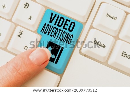 Sign displaying Video Advertising. Business overview encompasses online display advertisements that have video Typing Certification Document Concept, Retyping Old Data Files