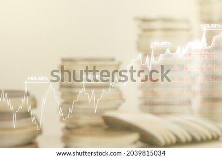 Double exposure of abstract creative financial chart hologram on growing stacks of coins background, research and strategy concept