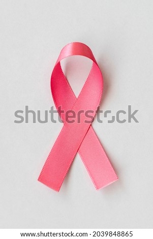 pink bow from the breast cancer prevention campaign. pink October Royalty-Free Stock Photo #2039848865