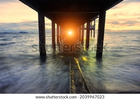 Sunset at Phuket Beach - view from under the pier