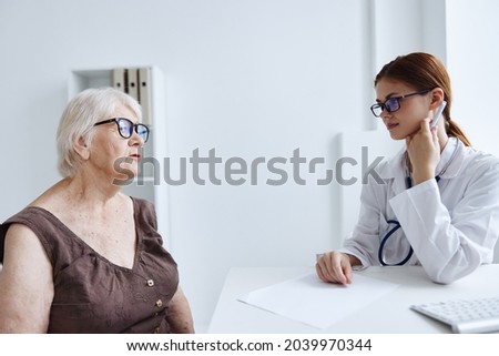 patient talking to the nurse medical office