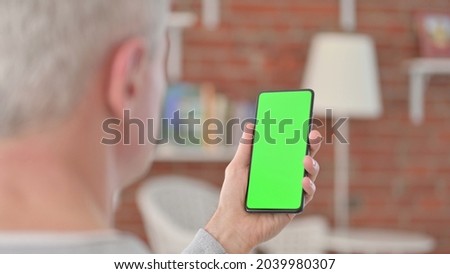 Old Man using Smartphone with Chroma Screen