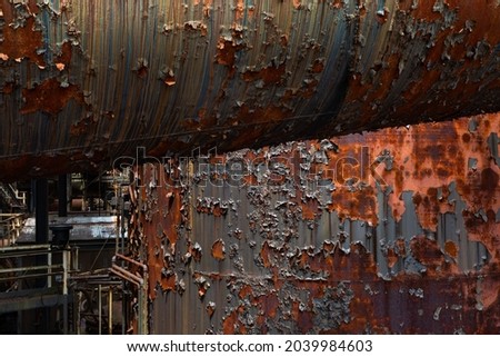Close-up of rusty Metal Parts and Pipes of a former Steel Plant Production Site, Concept Picture for Deindustrialization