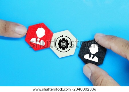 the concept of employee is exchanged with new employee. business concept Royalty-Free Stock Photo #2040002336