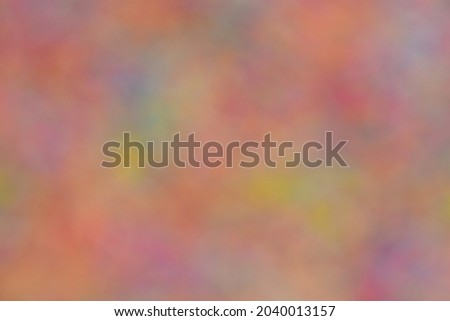 blurred image of multicolored cake topping sugar like an abstract picture