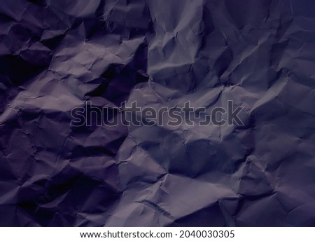 Dark crumpled paper texture. A basic background material, Ideal for school video intro compositions Royalty-Free Stock Photo #2040030305