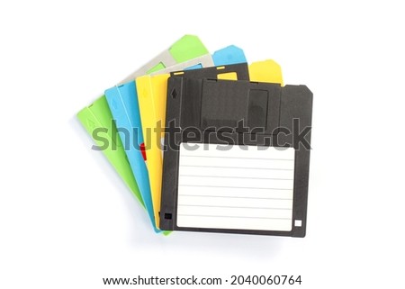 Top view of vintage floppy disk magnetic computer isolated on white background.