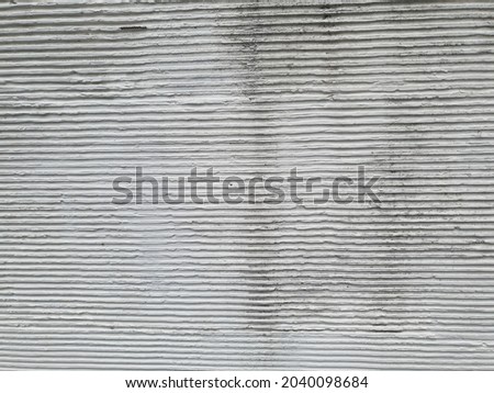 lined concrete texture on wall