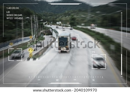 Ai tracking traffic automobile vehicle car recognizing speed limit and information system, security surveillance camera monitoring motorway traffic tracking artificial intelligent technology. Royalty-Free Stock Photo #2040109970