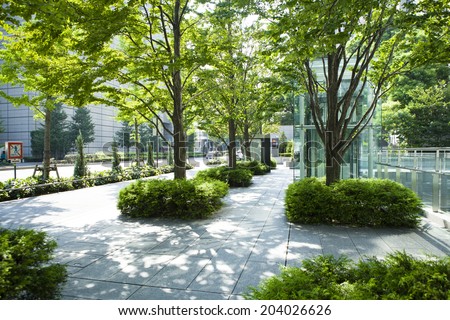 Urban landscape and trees Royalty-Free Stock Photo #204026626