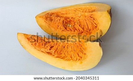 Malang, Indonesia - August 11, 2021 :
two slices of pumpkin on a white background