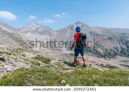 Hiker in the Never Summer Mountain area of Rocky Mountain National Park, Colorado USA Royalty-Free Stock Photo #2040372461