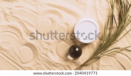 Set of cosmetic products jar bottle bottle beach sand background. Abstract podium natural materials product presentation sandy background