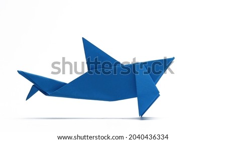 Blue Shark Paper Origami isolated on white background. Animal origami on white background