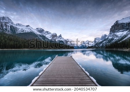 View of Spirit Island with wooden pier and Canadian Rockies on Maligne lake at Jasper national park, Canada Royalty-Free Stock Photo #2040534707