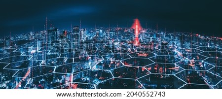 Smart network and Connection technology concept with Tokyo city background at night in Japan, Panorama view