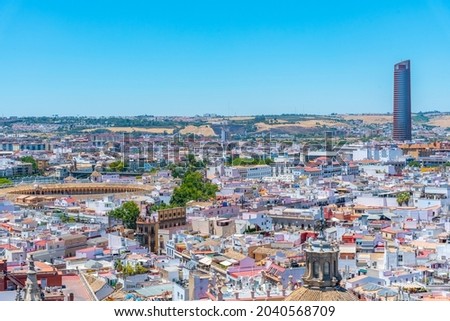 Aerial view of Sevilla with bullfighting arena and Torre Sevilla, Spain