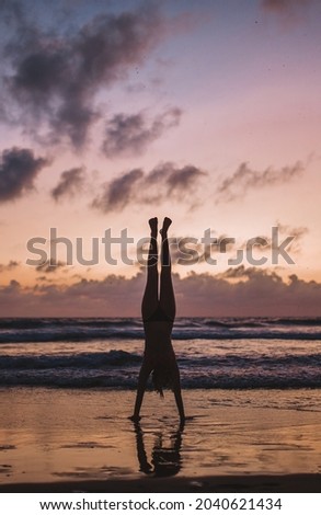 Sunset handstands on Kuta beach