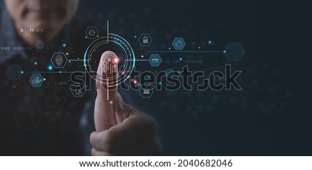 Digital banking, Internet payment, online marketing, personal financial data protection concept. Man scanning fingerprint via mobile banking app with face id and futuristic technology interface Royalty-Free Stock Photo #2040682046
