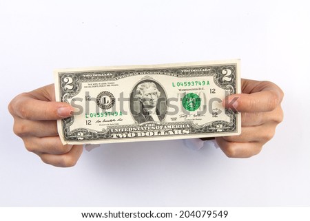 Money in  both hand coming from hole in white background