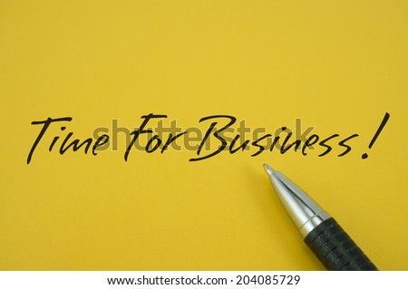 Time For Business! note with pen on yellow background