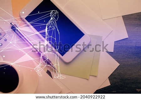 Multi exposure of creative drawing over table with phone. Top view. Concept of startup.