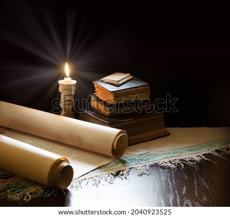 Grunge age dirty rough rustic brown open psalm pray talmud law paper page archive stack dark black wooden desk table space. New jew culture god Jesus Christ gospel literary art wood still life concept Royalty-Free Stock Photo #2040923525